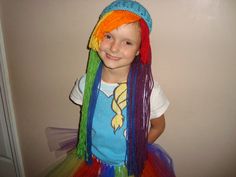 This wig hat was inspired by Rainbow Dash. The crochet cap is teal and the yarn hair is rainbow colors! What a great wig for your little one who loves My Little Pony. Great for costumes and dress up! See tutu section for Rainbow Dash inspired skirt. Message me with any questions or if you want a custom length or order. Pony Costumes, My Little Pony Costume, Jessie Toy Story, Yarn Hair, Wig Hat, Crochet Cap, Costume Hats, Rainbow Dash, Blue Berry Muffins