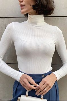 Stay cozy and stylish this season with our Basic Turtleneck Women Sweaters. Crafted from a premium quality blend, these tops feature a slim fit and ribbed turtleneck for sophisticated style. Ideal for cold autumn and winter days, they will keep you warm and comfortable all day long. White Ribbed Long Sleeve Turtleneck, Trendy Mock Neck Top For Winter, Trendy Fitted Mock Neck Top For Winter, Fitted Mock Neck Top For Winter, Winter Stretch Tops In Solid Color, White Long Sleeve Turtleneck For Work, Trendy Mock Neck Top For Winter Workwear, Fitted Solid Color Turtleneck For Winter, Trendy Mock Neck Top For Work In Winter