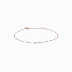 Our Emmeline Anklet is a dainty layer featuring eye-catching crystal balls. This anklet is the perfect fit for your casual, formal, and fancy looks. It will help you add layers of beauty, grace, and charm to your outfits. Look and feel exquisitely feminine with this anklet in your jewelry collection. You will never tire of wearing it, we promise! - Gold plating over Sterling silver- Cubic zirconia- Adjustable length measures 8.5"-9.5"- Available in Yellow Gold, White Gold, and Rose Gold Rose Gold Anklets For Party, Dainty Rose Gold Anklets For Gift, Delicate Gold Anklet With Adjustable Chain, Elegant Gold Metal Anklet, Elegant Adjustable 14k Gold-filled Anklets, Crystal Ball, Rhodium Plated, Anklets, Cubic Zirconia