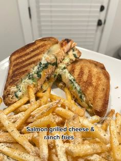 a grilled cheese and ranch fries on a plate with the words salmon grilled cheese & ranch fries