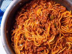 a pot filled with spaghetti and meat sauce