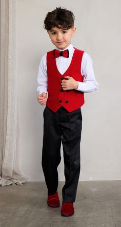 Tie Town takes the tie game to the next level with our drip and dapper tuxedo sets!  Tie Town Boy's Shawl Lapel Velvet Tuxedo is 4-pieces:  Vest, Pants, Dress Shirt, and matching Bow Tie!  This drip and dapper tuxedo set is an exquisite poly-rayon blend. Tuxedos are slim fit, so make room for allowances!  Wear for weddings, formal events, and the daily dapper!  Care instructions: Dry Clean Only Formal Tuxedo Style Vest, Formal Tuxedo Style Sleeveless Vest, Sleeveless Tuxedo Suit For Party, Sleeveless Tuxedo Vest For Formal Events, Fitted Sleeveless Tuxedo Set, Formal Boys Outfit, Red Frock, Vest And Bow Tie