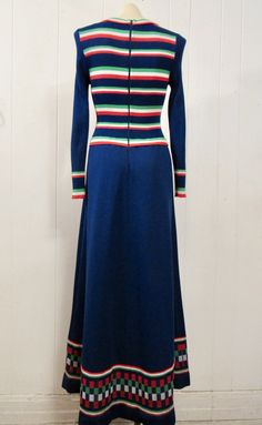 "Vintage 1960s maxi dress. Made of blue poly/cotton with green, white and red stripes. Has a back zipper. Sold at Lord & Taylor. Size medium. Actual measurements are: 27\"(stretches to 33\") around the bust 25\"(stretches to 31\") around the waist, 34\"(stretches to 37\") around the hips, 15.5\" shoulder seam to shoulder seam 24\" shoulder seam to cuff 58\" overall length In excellent condition." Striped Fitted A-line Maxi Dress, Retro Long Sleeve Striped Dress, Fitted Retro Dresses With Vertical Stripes, Retro Fitted Dress With Vertical Stripes, Green White Red, 1960s Dress, Marine Uniform, 1970s Dresses, 1960's Dress