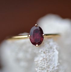 Red Garnet Ring / Red Garnet Engagement Ring in 14k Gold / Oval Cut Natural Red Garnet Ring / January Birthstone / Promise Ring Gemstone - Natural Red Garnet Metal - 925 solid sterling silver rhodium plated / 14k Solid Gold  Size - All sizes are available please choose accordingly The benefit of rhodium plating - Since rhodium is more durable than any other metal, it will protect anything it is plated over. Rhodium plating allows the jewelry piece to be less susceptible to corrosion and damage, Oval Garnet Engagement Ring, Garnet Eternity Ring, Red Garnet Engagement Ring, Fine Jewelry Garnet Solitaire Ring, Garnet Solitaire Fine Jewelry, Fine Jewelry Garnet Solitaire, Dainty Garnet Gemstone Rings, Dainty Oval Ruby Ring, Oval Garnet Jewelry With Prong Setting