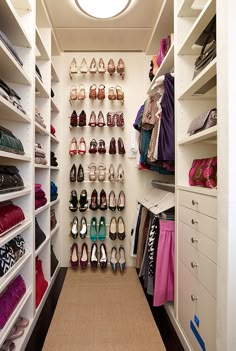 the closet is full of shoes and purses