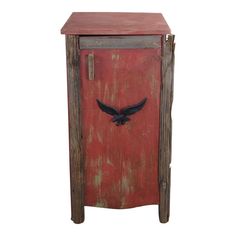 an old wooden cabinet with a bird painted on the front and side door, sitting upright