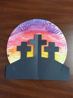 a paper plate with some crosses on it