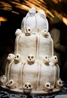 a large white cake with skulls on it