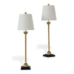 a pair of lamps sitting next to each other