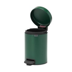 a green trash can with its lid open