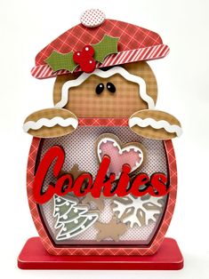 a christmas card with a cookie in a jar