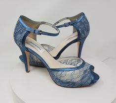 "Steele Blue Lace Wedding Shoes. Blue Lace Bridal shoes available in over 100 additional colors, including white and ivory. We can also color match a sample you send us. The shoes in the listing have been dyed Steele Blue. If you would like another color from my chart, David's Bridal color or sending me a swatch, please pick from the dye color drop down menu (chart color or David's Bridal color) and then let me know the color you would like in the personalization box. These beautiful satin and l Bridal Shoes Lace, Black Evening Shoes, Lace Wedding Shoes, Lace Bridal Shoes, Blue Bridal Shoes, Ivory Bridal Shoes, How To Dye Shoes, Wedding Shoes Lace, Holiday Shoes