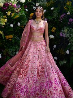 Elevate your elegance with this peach pink and ribbon red applique lehenga, adorned with intricate gota thread embroidery. Paired with a delicate net dupatta, this ensemble exudes charm and sophistication. Crafted with meticulous attention to detail, it's the perfect choice for making a graceful statement at any special occasion. Designer Pink Lehenga With Sheer Dupatta, Designer Lehenga With Intricate Embroidery In Pink, Designer Pink Lehenga With Intricate Embroidery, Pink Anarkali Lehenga With Resham Embroidery, Pink Semi-stitched Lehenga With Resham Embroidery, Pink Semi-stitched Lehenga With Sheer Dupatta, Semi-stitched Pink Lehenga With Sheer Dupatta, Pink Anarkali Lehenga With Intricate Embroidery, Designer Pink Embroidered Lehenga