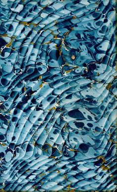 an abstract painting with blue, yellow and black colors on it's surface is shown