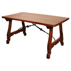 a wooden table sitting on top of a white background