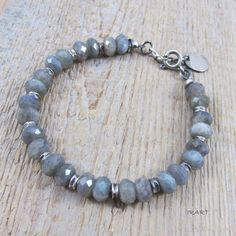 Bracelet made of 925 silver and Labradorite Silver oxidizes and polished. Length of the bracelet is 20,2 cm, plus the regulatory chain 2 cm. Suitable for wrist circumference from 17 to about 19 cm. The diameter of the stones: 8 mm The bracelet is packed in an elegant box. Cyber Sale 2023 Silver Labradorite Gemstone Bead Bracelets, Silver Labradorite Bracelets With Gemstone Beads, Silver Labradorite Bracelet With Gemstone Beads, Handmade Silver Labradorite Beaded Bracelets, Oxidized Sterling Silver, Jewelry Ideas, Arm Band, Bracelet Making, Labradorite