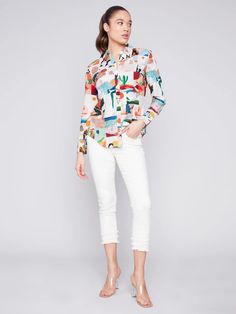 Get ready to make a statement with our Long Sleeves Shirt with Buttons! This shirt features a unique dessert print that is sure to catch everyone's eye. Perfect for any occasion, you'll stand out in style while feeling comfortable and confident. Elevate your wardrobe with this must-have piece!