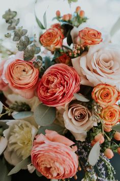 a bunch of flowers that are sitting on a table