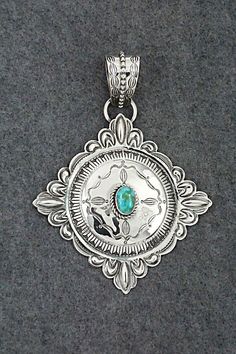 This stunning Sonoran Gold turquoise and sterling silver pendant was made by Navajo silversmith Roland Dixon. The back is signed Roland Dixon and stamped sterling.Length: 5 1/2"Width: 4 1/8"Free shipping on all orders! We ship with USPS and always include tracking. All orders ship within a day of payment.Returns are accepted up to 30 days after you receive your order. Just send us a message. Our shop offers cash back or store credit. The item must be returned in new condition. Native American Jewelry, Turquoise Sterling Silver, Sterling Silver Pendant, Free Jewelry, Sterling Silver Pendants, Silver Pendant, Favorite Jewelry, Jewelry Watches, Jewelry Necklaces