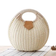 Portrait of a picture displaying Woven Rattan Round Shaped Handbag product. Rattan Handbags, Summer Handbags, Straw Handbags, Lv Bags, Rattan Bag, Straw Bags, Round Bag, Basket Bag, Woven Bag