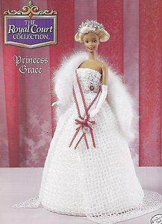 the barbie doll is wearing a white dress and tiara