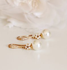 Gold Bridal Earrings Cream Pearl Earrings Gold Wedding Earrings by DreamIslandJewellery #pearlearrings #bridalearrings #wedding #jewelry #weddingjewelry #weddingearrings Elegant Formal Bridal Accessories With Pearl Drop, Classic Pearl Earrings With Ear Wire For Weddings, Classic Jewelry For Bridesmaids, Delicate Ear Wire Bridal Earrings For Formal Occasions, Delicate Formal Bridal Earrings With Ear Wire, Delicate Formal Bridal Earrings, Elegant White Earrings For Bridesmaids, Elegant Rose Gold Earrings For Wedding, Elegant Pearl Drop Bridesmaid Jewelry