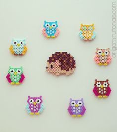 there are many different colored owls on this page and one is made out of perler beads