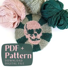 three balls of yarn with the skull and crossbones on them