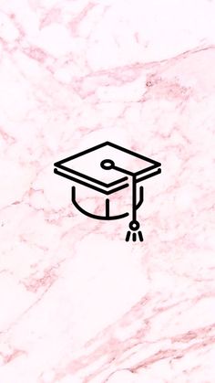 a black and white drawing of a graduation cap on a pink marble background with the word graduate written across it