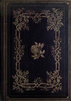 an old black book with gold trimming