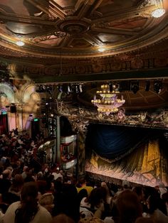 an overhead view of a theatre with people sitting on the stage