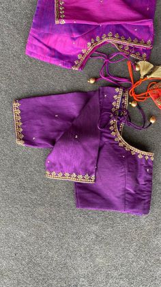 Hand embroidered ready made saree blouse / crop top/stitched saree blouse usa / purple v neck  saree blouse/ hand embroidered blouse/zardosi blouse/v neck  saree blouse/ purple pure silk blouse/ maggam work blouse        It is very true that a perfect blouse is the one which makes your saree look stand out !! If you find one of such a style that you have been wanting to have then dont let it go !! we carry such unique trending blouses that instantly add a stylish look to any saree !!     Well..!! we understand that you may not get in your desired size/pattern, here you go with customization according to your size/pattern which we can deliver in 1-2 weeks of time period !!      Here is a beautiful Hand embroidered saree blouse in purple color that has simple yet unique embroidery on necks a Purple Raw Silk Blouse Piece With Resham Embroidery, Purple Raw Silk Saree With Unstitched Blouse, Purple Embroidered Art Silk Choli, Purple Embroidered Dola Silk Choli, Traditional Purple Dola Silk Wear With Dabka Work, Purple Dabka Work Dola Silk Lehenga, Purple Dola Silk Saree With Dori Work, Purple Dola Silk Set With Unstitched Blouse, Purple Dabka Work Lehenga In Dola Silk