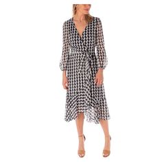 You're sure to love the look and feel of this stylish women's Maison Tara houndstooth printed wrap midi dress.Click on this WOMEN'S GUIDE to find the perfect fit and more! You're sure to love the look and feel of this stylish women's Maison Tara houndstooth printed wrap midi dress. Click on this WOMEN'S GUIDE to find the perfect fit and more! FEATURES Surplice neckline Zipper back 3/4-length balloon sleeves Elastic cuffs Partial elastic waistband with coordinating sash Ruffled hem Faux-wrap silh Spring Midi Dress With Houndstooth Pattern, Spring Houndstooth Midi Dress, Elegant Spring Midi Dress With Houndstooth Pattern, Elegant Midi Dress With Houndstooth Pattern For Spring, Elegant Houndstooth Midi Dress For Spring, Chic Houndstooth Pattern Midi Dress For Work, Workwear Midi-length Dresses With Houndstooth Pattern, Chic Houndstooth Midi Dress For Work, Knee-length Houndstooth Midi Dress