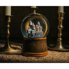 a snow globe sitting on top of a table