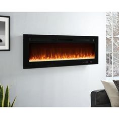 a wall mounted electric fireplace in a living room