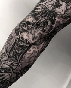 a man with a tattoo on his arm