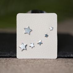 Sterling silver tiny star stud earring in variable sizes. Perfect earrings set for multiple piercings earring to layer and add extra sparkle! - Silver star stud earrings, Star stud earring gold, Star stud earring silver, Star Earrings Stud, Star earring, silver star studs, gold star earrings, starburst studs, starburst earrings - Qty: 3 pairs per set - Dimension: Variable sizes ranging from 4 mm to 9 mm in diameters - Material: 925 sterling silver, 14 K gold plated on 925 sterling silver, hypoal Hypoallergenic Sterling Silver Nose Studs As Gift, Silver Star-shaped Pierced Cartilage Earrings, Silver Star-shaped Cartilage Earrings With Pierced Design, Minimalist Sterling Silver Nose Studs For Gifts, Nickel Free Silver Star-shaped Piercing, Silver Star Single Stud Earring, Nickel Free Star Shaped Silver Cartilage Earrings, Sterling Silver Star-shaped Piercings, Minimalist Nickel-free Sterling Silver Nose Studs