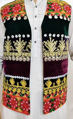 Here is an Afghan Kuchi Pashtun men handmade zari  silver embroidery work vest waistcoat. Traditionally such vests are used on special events like wedding Nikah and Mehndi event. Available in small, medium and large size. It contains very beautiful golden color threads embroidery work which is traditionally called "Zari or Tilai" embroidery work. Fabric is long lasting, comfortable and breathable. Traditional Sleeveless Vest For Festive Occasions, Traditional Sleeveless Festive Vest, Festive Vest With Multicolor Embroidery, Festive Embroidered Vest With Multicolor Embroidery, Festive Embroidered Multicolored Vest, Traditional Nehru Jacket With Dabka Work For Festivals, Traditional Embroidered Festive Vest, Traditional Wedding Vest For Festive Season, Traditional Wedding Vest For Festive Occasions