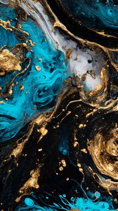 an abstract painting with gold and blue paint on it's surface, as seen from above