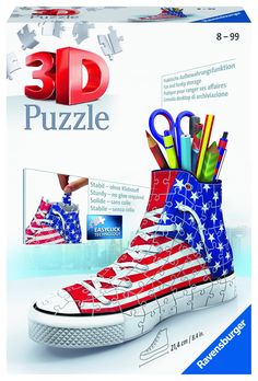 an american flag shoe with scissors and pencils in it's bottom, next to the 3d puzzle box