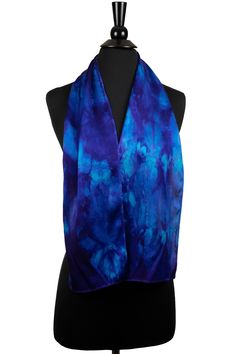 "Made from substantial 19 mm silk charmeuse with hand rolled edges, these scarves have a luxurious drape and sheen that you won't find in cheaper silk. The imported 100% silk scarves are hand dyed in small batches in my Silver Spring, MD studio. My unique process encourages colors to separate and recombine, creating beautiful  patterns of unparalleled richness and depth.  Large scarf measures approximately 8\" wide by 51\" long. Hand wash or dry clean. This item is ready to ship! Order by December 18 for delivery by Christmas (USA).  Additional sizes and quantities available made-to-order: https://www.etsy.com/listing/660944973 Photos are representative of the style and color of the scarf, but may not depict the actual piece you will receive. Each hand-dyed silk scarf is one of a kind, so Emerald Green Outfit, Abstract Scarf, Crinkle Scarf, Hand Dyed Silk Scarf, Green Silk Scarf, Blue Silk Scarf, Long Silk Scarf, Shibori Dye, Silk Scarf Painting