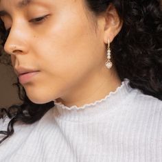 Handcrafted out of wire, faux pearls and cubic zirconia heart shaped charms! And also modeled by me :-) #handmadeearrings #daintyearrings #earringsociety #minimalistearrings #earringsoftheday #cutejewelry #pearlearrings #handmadebusiness #luxuryearrings #studdedearrings #goldjewelry #charmearrings #trendyearrings #springjewelry #modernjewelry #fashionfinds #handmadefashion #jewelryinspo #jewelryinspiration Rose Gold Pearl Earrings With Cubic Zirconia, Rose Gold Cubic Zirconia Pearl Earrings, Heart-shaped Cubic Zirconia Crystal Earrings For Wedding, Heart-shaped Crystal Earrings For Wedding, Rose Gold Chandelier Earrings For Anniversary, Silver Heart Earrings With Pearl Drop, Heart-shaped Sparkling Earrings For Wedding, Rose Gold Heart Drop Earrings For Wedding, Cubic Zirconia Drop Earrings With Sparkling Stones