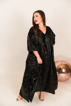 Be the life of the party in this long sequin caftan! This show-stopping caftan is adorned with shimmering sequins that will catch the light and turn heads. With a flowy, relaxed fit, it combines style and comfort. The long length ensures you'll bring the fashion drama, while the sequins add a touch of glamour to your look. These comfortable sequins on mesh are lined for max comfortability. Stretch Mesh Fabric, Long Length, Black Sequins, Floor Length, Satin, Relaxed Fit, Turn Ons, Black