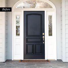 a black front door with the name someone written on it