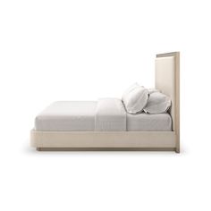 a bed with white sheets and pillows on it's headboard, against a white background