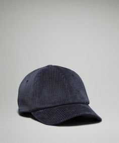 the corded baseball cap in navy blue is made from cotton and features an unstructed brimmed peak