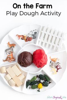 a white plate topped with different types of play dough and toy animals on top of it