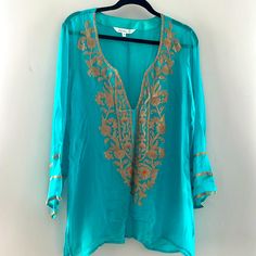 Deep V Neck. Can Be Worn With Tank Underneath Or Bathing Suit! 100% Rayon 30 Inches Long 22 Inches Across Chest Blue Bollywood Top With Floral Embroidery, Blue V-neck Embroidered Top For Beach, Bollywood Style Long Sleeve Summer Tops, Long Sleeve Embroidered Blue Tunic, Embroidered Long Sleeve Blue Tunic, Summer Blue Embroidered Top With Chikankari, Embroidered V-neck Tunic For Festive Occasions, Summer Festive Embroidered V-neck Top, Summer Festive V-neck Embroidered Top