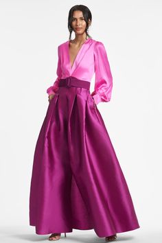 Shop the Beatrix Gown in Fuchsia at Sachin & Babi. FREE Shipping Over $500 & FREE Returns. Formal Pink Dress With Voluminous Skirt, Pink Formal Dress With Voluminous Skirt, Pink Dress With Voluminous Skirt For Formal Occasions, V-neck Satin Finish Gown For Gala, Satin Finish V-neck Gown For Gala, Pink Silk V-neck Evening Dress, Formal Pleated Satin Gown, Silk V-neck Gown For Gala, Pink Satin Gown For Formal Occasions