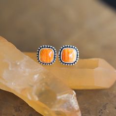 You get the color you need with this fantastic Spiny Oyster! Some days all we want is a pop of the perfect, bright orange color -- Spiny Oyster is where we find this sunny red/orange in western jewelry ... and also here at LBJ! We love it! The cutest post earrings you will own! Cushion cut squares in Spiny Oyster pop in this simple western design. Embellished with .925 Sterling beaded accent, they still remain small ... but pack a punch with the pop of color! Spiny Oyster Cushion Cut Squares (8m Nickel Free Orange Earrings For Gift, Oyster Earrings, Orange Pierced Earrings As Gift, Oyster Turquoise Jewelry, Adjustable Orange Pierced Jewelry, Hypoallergenic Orange Sterling Silver Jewelry, Orange Hypoallergenic Sterling Silver Jewelry, Nickel-free Orange Earrings For Gift, Unique Orange Nickel-free Jewelry